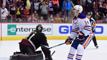 Nov 25, 2016; Glendale, AZ, USA; Arizona Coyotes goalie Mike Smith (41) stops Edmonton Oilers right wing Jordan Eberle (14) during a shootout to win the game 3-2 at Gila River Arena. Mandatory Credit: Matt Kartozian-USA TODAY Sports