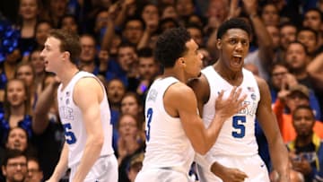 DURHAM, NORTH CAROLINA - MARCH 05: Alex O'Connell #15, Tre Jones #3 and RJ Barrett #5 of the Duke Blue Devils celebrate during the final seconds of their win against the Wake Forest Demon Deacons at Cameron Indoor Stadium on March 05, 2019 in Durham, North Carolina. Duke won 71-70. (Photo by Grant Halverson/Getty Images)