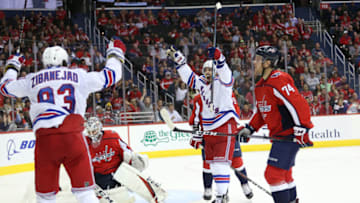 WASHINGTON, DC - OCTOBER 17: Chris Kreider #20 of the New York Rangers celebrates with Mika Zibanejad #93 after a goal against the Washington Capitals during the third period at Capital One Arena on October 17, 2018 in Washington, DC. (Photo by Will Newton/Getty Images)