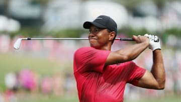 PONTE VEDRA BEACH, FL - MAY 13: Tiger Woods of the United States plays his second shot on the ninth hole during the final round of THE PLAYERS Championship on the Stadium Course at TPC Sawgrass on May 13, 2018 in Ponte Vedra Beach, Florida. (Photo by Richard Heathcote/Getty Images)
