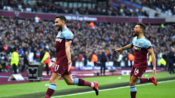 LONDON, ENGLAND - FEBRUARY 01: Robert Snodgrass of West Ham United celebrates with Ryan Fredericks after scoring his team's second goal during the Premier League match between West Ham United and Brighton & Hove Albion at London Stadium on February 01, 2020 in London, United Kingdom. (Photo by Mike Hewitt/Getty Images)
