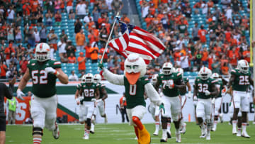 MIAMI GARDENS, FL - SEPTEMBER 23: Sebastian the Ibis, the Miami Hurricanes mascot leads the team onto the field for their game against the Toledo Rockets on September 23, 2017 at Hard Rock Stadium in Miami Gardens, Florida. Miami defeated Toledo 52-30. (Photo by Joel Auerbach/Getty Images)