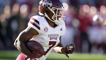 FAYETTEVILLE, ARKANSAS - NOVEMBER 6: Jo"u2019quavious Marks #7 of the Mississippi State Bulldogs runs the ball during a game against the Arkansas Razorbacks at Donald W. Reynolds Stadium on November 6, 2021 in Fayetteville, Arkansas. The Razorbacks defeated the Bulldogs 31-28. (Photo by Wesley Hitt/Getty Images)