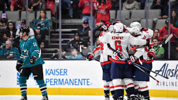 SAN JOSE, CA - DECEMBER 3: John Carlson #74, Carl Hagelin #62, Michael Kempny #6 and Travis Boyd #72 of the Washington Capitals celebrate scoring a goal against the San Jose Sharks at SAP Center on December 3, 2019 in San Jose, California. (Photo by Brandon Magnus/NHLI via Getty Images)