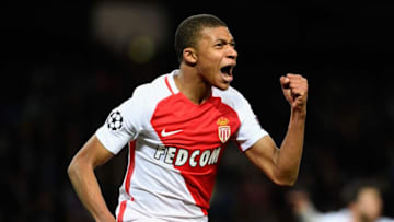 MANCHESTER, ENGLAND - FEBRUARY 21: Kylian Mbappe of AS Monaco celebrates as he scores their second goal during the UEFA Champions League Round of 16 first leg match between Manchester City FC and AS Monaco at Etihad Stadium on February 21, 2017 in Manchester, United Kingdom. (Photo by Stu Forster/Getty Images)