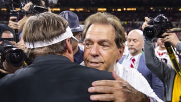 Jan 10, 2022; Indianapolis, IN, USA; Alabama Crimson Tide head coach Nick Saban and Georgia Bulldogs head coach Kirby Smart embrace and talk after the 2022 CFP college football national championship game at Lucas Oil Stadium. Mandatory Credit: Mark J. Rebilas-USA TODAY Sports