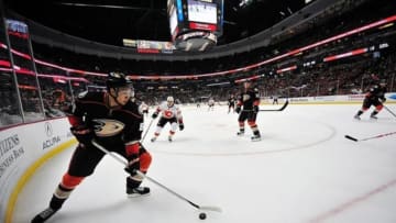 March 8, 2013; Anaheim, CA, USA; Anaheim Ducks right wing Emerson Etem (65) controls the puck against the Calgary Flames during the third period at Honda Center. Mandatory Credit: Gary A. Vasquez-USA TODAY Sports
