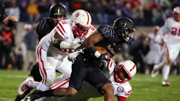 Oct 18, 2014; Evanston, IL, USA; Northwestern Wildcats wide receiver Miles Shuler (5) tries to get past Nebraska Cornhuskers defensive tackle Vincent Valentine (98) during the first half at Ryan Field. Mandatory Credit: Caylor Arnold-USA TODAY Sports
