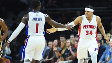 Jan 3, 2017; Auburn Hills, MI, USA; Detroit Pistons forward Tobias Harris (34) high fives guard Reggie Jackson (1) during the first quarter against the Indiana Pacers at The Palace of Auburn Hills. Mandatory Credit: Tim Fuller-USA TODAY Sports