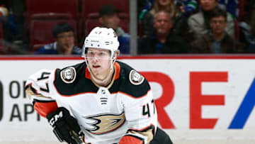 VANCOUVER, BC - MARCH 27: Hampus Lindholm #47 of the Anaheim Ducks skates up ice with the puck during their NHL game against the Vancouver Canucks at Rogers Arena March 27, 2018 in Vancouver, British Columbia, Canada. (Photo by Jeff Vinnick/NHLI via Getty Images)"n
