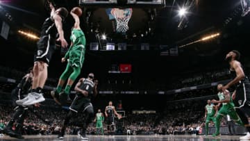 BROOKLYN, NY - JANUARY 6: Jayson Tatum #0 of the Boston Celtics dunks the ball against the Brooklyn Nets on January 6, 2018 at Barclays Center in Brooklyn, New York. NOTE TO USER: User expressly acknowledges and agrees that, by downloading and/or using this photograph, user is consenting to the terms and conditions of the Getty Images License Agreement. Mandatory Copyright Notice: Copyright 2018 NBAE (Photo by Nathaniel S. Butler/NBAE via Getty Images)