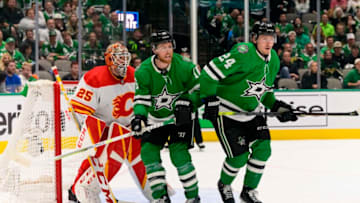 May 9, 2022; Dallas, Texas, USA; Dallas Stars center Joe Pavelski (16) and center Roope Hintz (24) screen Calgary Flames goaltender Jacob Markstrom (25) during the third period in game four of the first round of the 2022 Stanley Cup Playoffs at American Airlines Center. Mandatory Credit: Jerome Miron-USA TODAY Sports