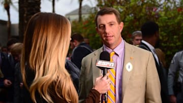 Jan 8, 2016; Scottsdale, AZ, USA; Clemson Tigers head coach Dabo Swinney (R) talks with ESPN reporter Samantha Ponder (L) after arriving to the Hyatt Regency Scottsdale Resort at Gainey Ranch. Mandatory Credit: Jennifer Stewart-USA TODAY Sports