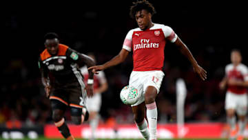 LONDON, ENGLAND - SEPTEMBER 26: Alex Iwobi of Arsenal runs with the ball during the Carabao Cup Third Round match between Arsenal and Brentford at Emirates Stadium on September 26, 2018 in London, England. (Photo by Shaun Botterill/Getty Images)