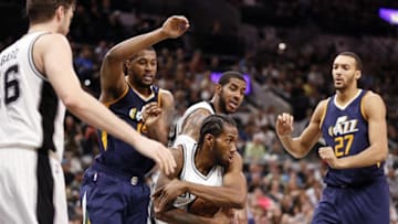 Nov 1, 2016; San Antonio, TX, USA; San Antonio Spurs small forward Kawhi Leonard (2) pulls down a rebound against the Utah Jazz during the first half at AT&T Center. Mandatory Credit: Soobum Im-USA TODAY Sports