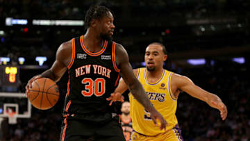 Nov 23, 2021; New York, New York, USA; New York Knicks forward Julius Randle (30) controls the ball against Los Angeles Lakers guard Talen Horton-Tucker (5) during the third quarter at Madison Square Garden. Mandatory Credit: Brad Penner-USA TODAY Sports