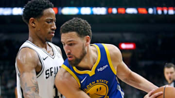 SAN ANTONIO, TX - MARCH 18: DeMar DeRozan #10 of the San Antonio Spurs pressures Klay Thompson #11 of the Golden State Warriors at AT&T Center on March 18, 2019 in San Antonio, Texas. NOTE TO USER: User expressly acknowledges and agrees that , by downloading and or using this photograph, User is consenting to the terms and conditions of the Getty Images License Agreement. (Photo by Ronald Cortes/Getty Images)