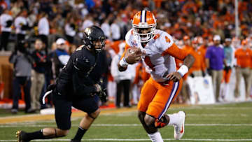 Nov 19, 2016; Winston-Salem, NC, USA; Clemson Tigers quarterback Deshaun Watson (4) runs the ball during the second quarter against the Wake Forest Demon Deacons at BB&T Field. Mandatory Credit: Jeremy Brevard-USA TODAY Sports