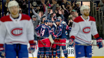 COLUMBUS, OH - MARCH 28: Columbus Blue Jackets right wing Oliver Bjorkstrand (28) celebrates with teammates after scoring a goal in a game between the Columbus Blue Jackets and the Montreal Canadiens on March 28, 2019 at Nationwide Arena in Columbus, OH. (Photo by Adam Lacy/Icon Sportswire via Getty Images)