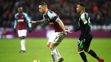 LONDON, ENGLAND - JANUARY 20: Marko Arnautovic of West Ham United and Junior Stanislas of AFC Bournemouth battle for the ball during the Premier League match between West Ham United and AFC Bournemouth at London Stadium on January 20, 2018 in London, England. (Photo by Julian Finney/Getty Images)