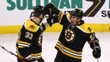 Nov 17, 2015; Boston, MA, USA; Boston Bruins left wing Brad Marchand (63) celebrates his goal against the San Jose Sharks with defenseman Zdeno Chara (33) during the first period at TD Garden. Mandatory Credit: Mark L. Baer-USA TODAY Sports