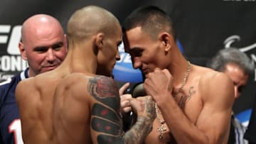 LAS VEGAS, NV - FEBRUARY 03: (L-R) Featherweight opponents Dustin Poirier and Max Holloway face off after weighing in during the UFC 143 official weigh in at Mandalay Bay Events Center on February 3, 2012 in Las Vegas, Nevada.|2:55:8 (Photo by Josh Hedges/Zuffa LLC/Zuffa LLC via Getty Images)