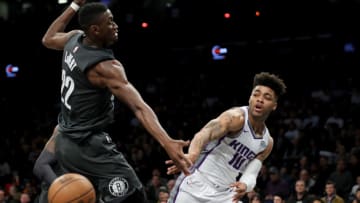 NEW YORK, NY - DECEMBER 20: Frank Mason III #10 of the Sacramento Kings passes the ball against Rondae Hollis-Jefferson #24 of the Brooklyn Nets in the fourth quarter during their game at Barclays Center on December 20, 2017 in the Brooklyn Borough of New York City. NOTE TO USER: User expressly acknowledges and agrees that, by downloading and or using this photograph, User is consenting to the terms and conditions of the Getty Images License Agreement. (Photo by Abbie Parr/Getty Images)