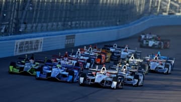 Apr 2, 2016; Avondale, AZ, USA; Verizon IndyCar Series driver Helio Castroneves (3) races three wide with Tony Kanaan (10) and Charlie Kimball (83) at the green flag during the Phoenix Grand Prix at Phoenix International Raceway. Mandatory Credit: Mark J. Rebilas-USA TODAY Sports