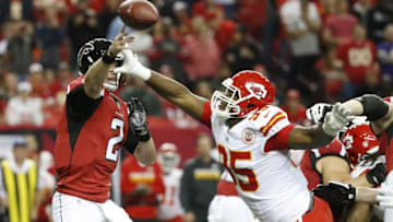 Dec 4, 2016; Atlanta, GA, USA; Atlanta Falcons quarterback Matt Ryan (2) throws the ball as from Kansas City Chiefs defensive end Chris Jones (95) defends in the first quarter of their game at the Georgia Dome. Mandatory Credit: Jason Getz-USA TODAY Sports