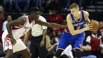 Oct 4, 2016; Houston, TX, USA; New York Knicks forward Kristaps Porzingis (6) controls the ball as Houston Rockets center Clint Capela (15) defends during the second quarter at Toyota Center. Mandatory Credit: Troy Taormina-USA TODAY Sports