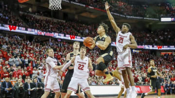 MADISON, WI - FEBRUARY 15: Wisconsin guard Khalil Iverson (21) tries to keep a flying Purdue guard Carsen Edwards (3) from scoring during a college basketball game between the University of Wisconsin Badgers and the Purdue University Boilermakers on February 15, 2018 at the Kohl Center in Madison, WI. (Photo by Lawrence Iles/Icon Sportswire via Getty Images)