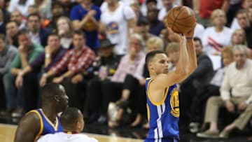 May 9, 2016; Portland, OR, USA; Golden State Warriors guard Stephen Curry (30) shoots a jump shot in overtime against the Portland Trail Blazers in game four of the second round of the NBA Playoffs at Moda Center at the Rose Quarter. Mandatory Credit: Jaime Valdez-USA TODAY Sports