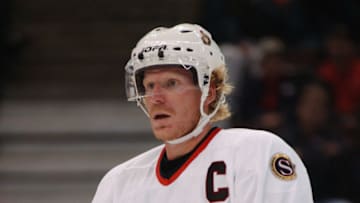 OTTAWA, CANADA - OCTOBER 4: Right wing Daniel Alfredsson #11 of the Ottawa Senators looks on against the Tampa Bay Lightning during the NHL game on October 4, 2002 at the Corel Centre in Kanata, Canada. Senators won 5-1. (Photo by Dave Sandford/Getty Images/NHLI)