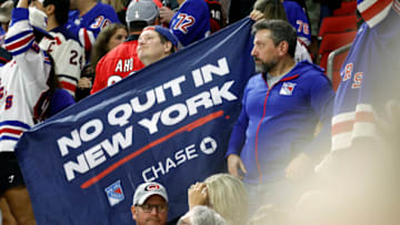 RALEIGH, NORTH CAROLINA - MAY 30: New York Rangers fans cheer during the third period in Game Seven of the Second Round of the 2022 Stanley Cup Playoffs against the Carolina Hurricanes at PNC Arena on May 30, 2022 in Raleigh, North Carolina. (Photo by Jared C. Tilton/Getty Images)