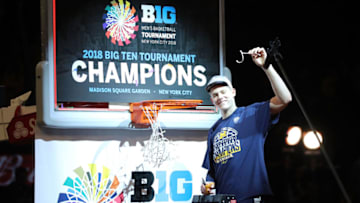 Tournament MVP Moritz Wagner #13 of the Michigan Wolverines celebrates after defeating the Purdue Boilermakers 75-66 during the championship game of the Big 10 Basketball Tournament at Madison Square Garden on March 4, 2018 in New York City. (Photo by Abbie Parr/Getty Images)