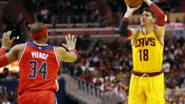 Nov 21, 2014; Washington, DC, USA; Cleveland Cavaliers forward Mike Miller (18) shoots the ball as Washington Wizards forward Paul Pierce (34) defends in the third quarter at Verizon Center. The Wizards won 91-78. Mandatory Credit: Geoff Burke-USA TODAY Sports