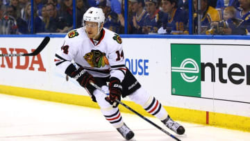 Apr 15, 2016; St. Louis, MO, USA; Chicago Blackhawks right wing Richard Panik (14) skates with the puck during game two of the first round of the 2016 Stanley Cup Playoffs against the St. Louis Blues at Scottrade Center. The Blackhawks won the game 3-2. Mandatory Credit: Billy Hurst-USA TODAY Sports