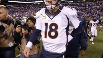 Nov 8, 2015; Indianapolis, IN, USA; Denver Broncos quarterback Peyton Manning (18) walks off the field after the game against the Indianapolis Colts at Lucas Oil Stadium. Indianapolis defeats Denver 27-24. Mandatory Credit: Brian Spurlock-USA TODAY Sports