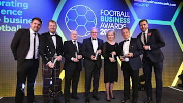 LONDON, ENGLAND - NOVEMBER 02: Neil Rowe - Head of Partnerships FC Business, Duncan Fraser - CEO of Aberdeen FC, Andy Mullen - Sheffield United FC, John Kay - CEO Preston North End FC, Donna Maria-Cullen - Tottenham Hotspur FC, Gary Sweet - Luton Town FC and host Mark Chapman pose for a photograph after the presentation of the FC Business CEO of the Year award for the individual UK leagues during the Football Business Awards evening at Tobacco Dock on November 2, 2017 in London, England. (Photo by Alex Morton/Getty Images for Football Business Awards )