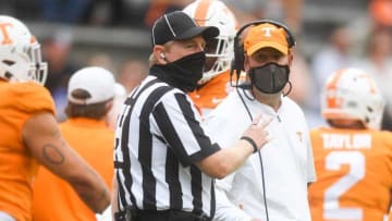 Tennessee Head Coach Jeremy Pruitt speaks with a game official during a game between Alabama and Tennessee at Neyland Stadium in Knoxville, Tenn. on Saturday, Oct. 24, 2020.102420 Ut Bama Gameaction