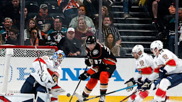 ANAHEIM, CA - MARCH 17: Nick Ritchie #37 of the Anaheim Ducks battles for the puck against Sam Montembeault #33, Troy Brouwer #22, and Mark Pysyk #13 of the Florida Panthers during the game on March 17, 2019 at Honda Center in Anaheim, California. (Photo by Debora Robinson/NHLI via Getty Images)
