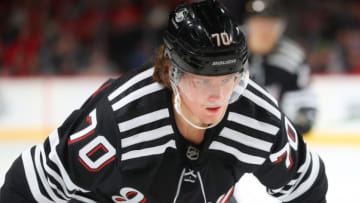 NEWARK, NJ - APRIL 03: Jesper Boqvist #70 of the New Jersey Devils during the game againstf the New York Islanderss on April 3, 2022 at the Prudential Center in Newark, New Jersey. (Rich Graessle/Getty Images)
