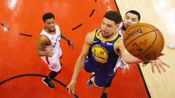 TORONTO, ONTARIO - JUNE 02: Klay Thompson #11 of the Golden State Warriors attempts a shot against Fred VanVleet #23 of the Toronto Raptors during Game Two of the 2019 NBA Finals at Scotiabank Arena on June 02, 2019 in Toronto, Canada. NOTE TO USER: User expressly acknowledges and agrees that, by downloading and or using this photograph, User is consenting to the terms and conditions of the Getty Images License Agreement. (Photo by Kyle Terada - Pool/Getty Images)