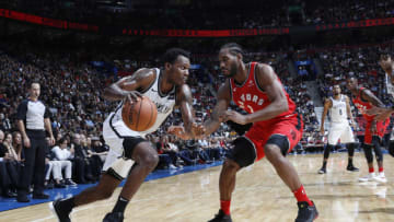 Toronto Raptors - Kawhi Leonard and Brooklyn Nets Treveon Graham (Photo by Mark Blinch/NBAE via Getty Images)