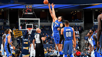 MEMPHIS, TN - OCTOBER 2: Nikola Vucevic #9 of the Orlando Magic goes for the tip off against the Memphis Grizzlies during a preseason game on October 2, 2017 at FedExForum in Memphis, Tennessee. NOTE TO USER: User expressly acknowledges and agrees that, by downloading and or using this photograph, User is consenting to the terms and conditions of the Getty Images License Agreement. Mandatory Copyright Notice: Copyright 2017 NBAE (Photo by Jesse D. Garrabrant/NBAE via Getty Images)