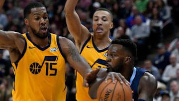 SALT LAKE CITY, UT - OCTOBER 22: Shelvin Mack #6 of the Memphis Grizzlies looks to pass around the defense of Derrick Favors #15 and Dante Exum #11 of the Utah Jazz in the first half of a NBA game at Vivint Smart Home Arena on October 22, 2018 in Salt Lake City, Utah. NOTE TO USER: User expressly acknowledges and agrees that, by downloading and or using this photograph, User is consenting to the terms and conditions of the Getty Images License Agreement. (Photo by Gene Sweeney Jr./Getty Images)