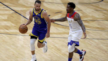 NEW ORLEANS, LOUISIANA - MAY 04: Stephen Curry #30 of the Golden State Warriors is defneded by Eric Bledsoe #5 of the New Orleans Pelicans during the first quarter of an NBA game at Smoothie King Center on May 04, 2021 in New Orleans, Louisiana. NOTE TO USER: User expressly acknowledges and agrees that, by downloading and or using this photograph, User is consenting to the terms and conditions of the Getty Images License Agreement. (Photo by Sean Gardner/Getty Images)