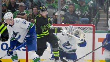 Mar 25, 2023; Dallas, Texas, USA; Dallas Stars center Joe Pavelski (16) attempts to redirect the puck past Vancouver Canucks goaltender Thatcher Demko (35) during the third period at the American Airlines Center. Mandatory Credit: Jerome Miron-USA TODAY Sports
