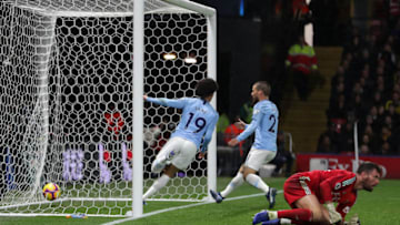 WATFORD, ENGLAND - DECEMBER 04: Leroy Sané of Man City scores the first goal past Ben Foster of Watford during the Premier League match between Watford FC and Manchester City at Vicarage Road on December 04, 2018 in Watford, United Kingdom. (Photo by Richard Heathcote/Getty Images)
