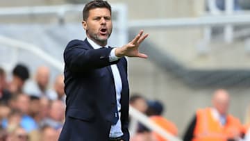 Tottenham Hotspur's Argentinian head coach Mauricio Pochettino shouts instructions to his players from the touchline during the English Premier League football match between Newcastle United and Tottenham Hotspur at St James' Park in Newcastle-upon-Tyne, north east England on August 11, 2018. (Photo by Lindsey PARNABY / AFP) / RESTRICTED TO EDITORIAL USE. No use with unauthorized audio, video, data, fixture lists, club/league logos or 'live' services. Online in-match use limited to 120 images. An additional 40 images may be used in extra time. No video emulation. Social media in-match use limited to 120 images. An additional 40 images may be used in extra time. No use in betting publications, games or single club/league/player publications. / (Photo credit should read LINDSEY PARNABY/AFP/Getty Images)